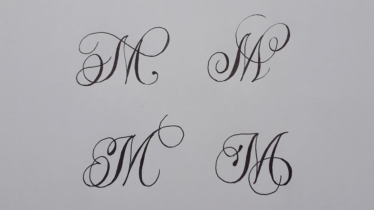 m in cursive capital