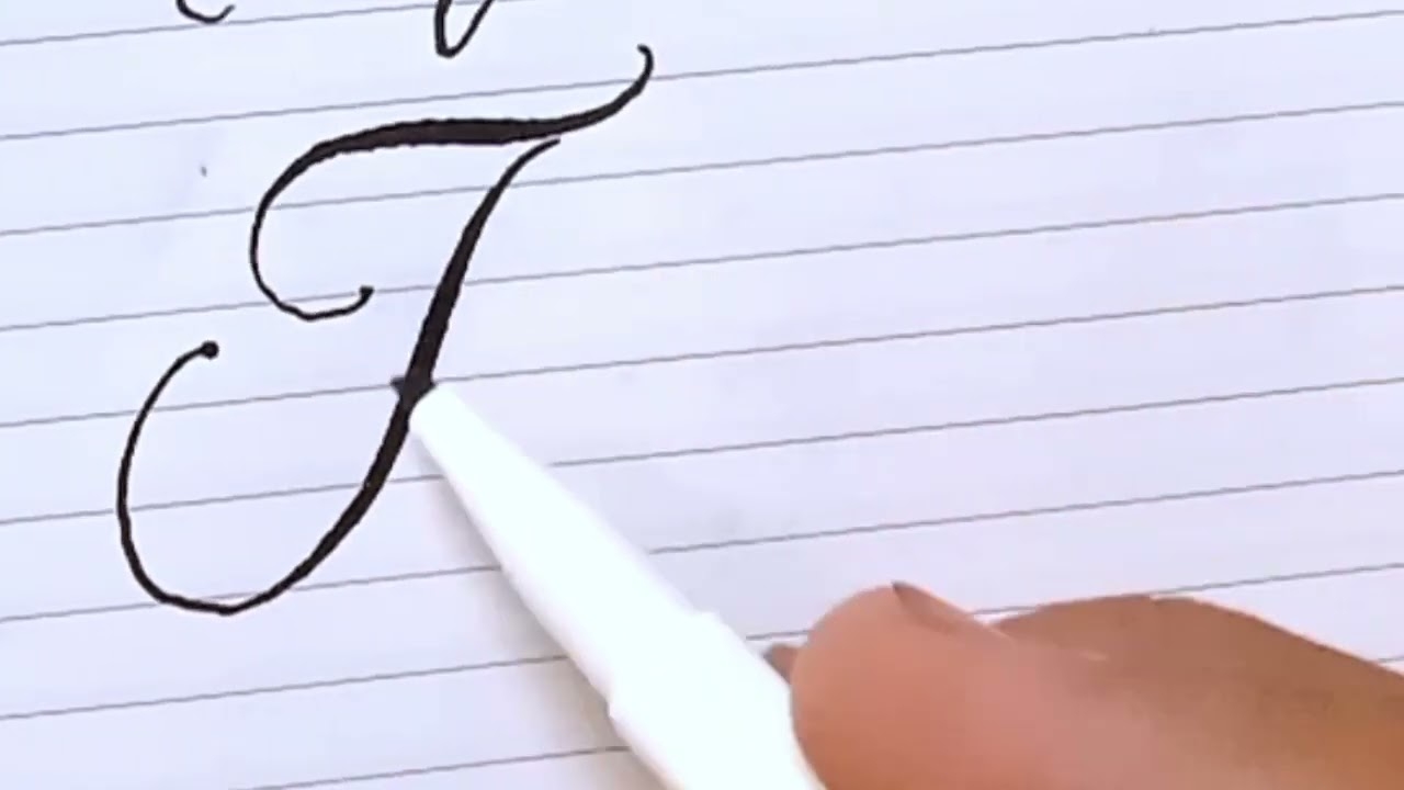 capital t in cursive